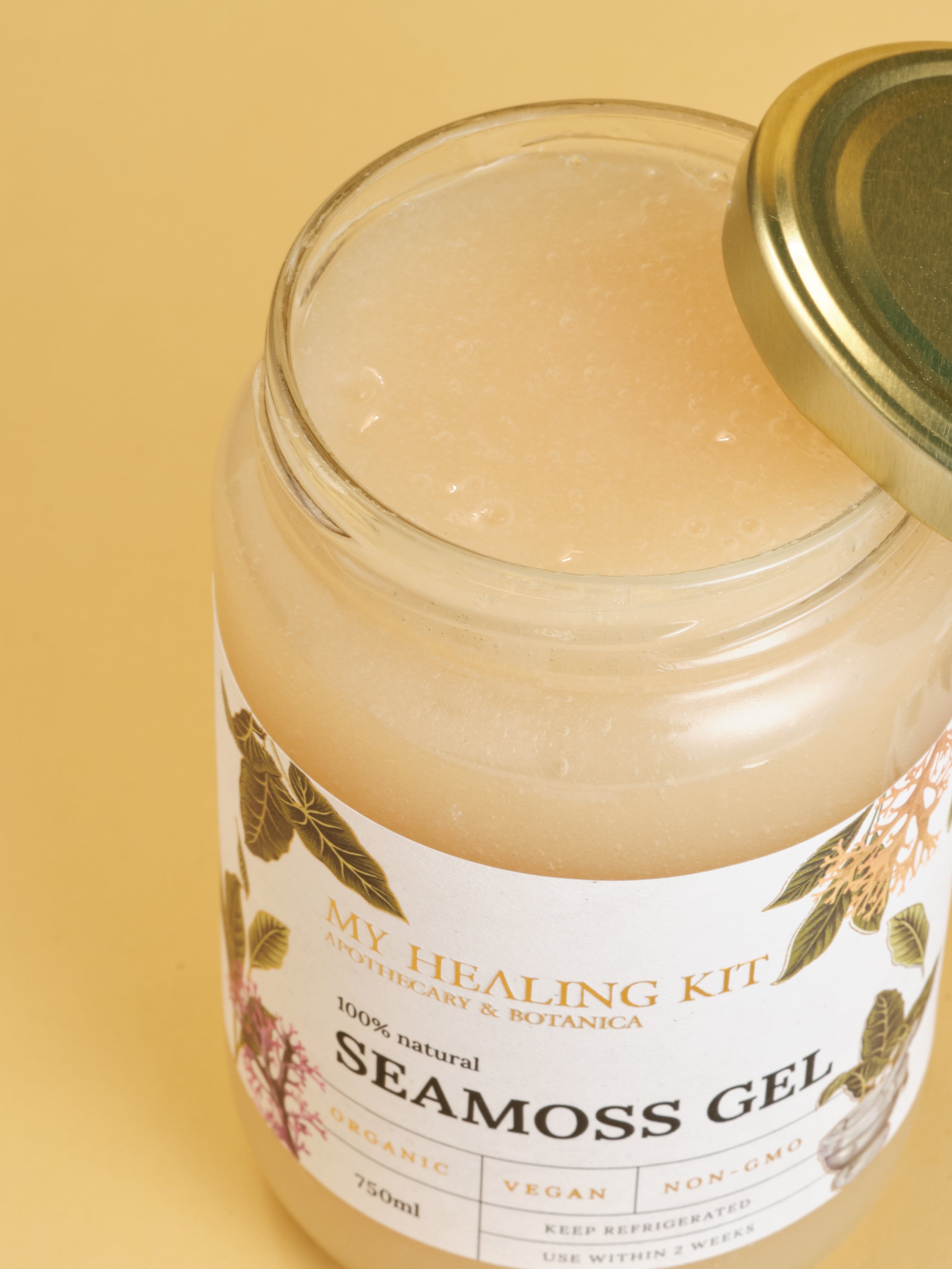 Open  jar of gold Sea Moss Gel, a nutrient-rich superfood 
