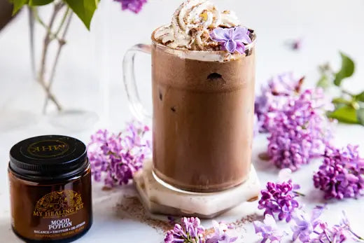 A bottle of Mood Potion, a carefully formulated concoction of organic elements intended to support emotional balance and well-being.